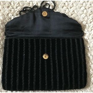 Evening purse Beaded on Black Velvet LaRegale gold trim and removable chain.